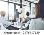 Presentation, graphs or businessman by board for writing, growth stats or revenue in meeting. Charts results, report or speaker teaching for training or sales coaching for learning in modern office