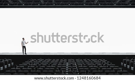 Presentation hall with person on scene auditorium watching on blank screen mockup. Empty display with speaker represent mock up. Public on training or forum template.