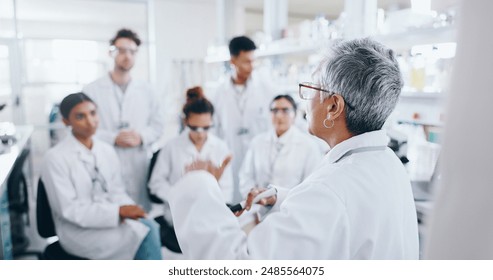 Presentation, research and team of scientists in laboratory with mentor for bio medical internship. Question, discussion and pharmaceutical science students with lecturer for experiment or discovery. - Powered by Shutterstock