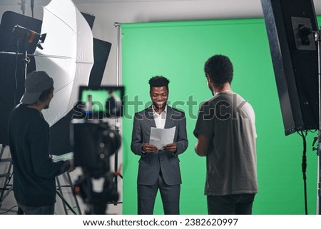 Presenter reading the script before video shooting