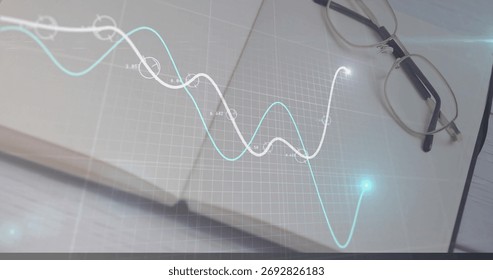 Presenting spiral-bound notebook featuring grid overlay on wooden desk, with metal-frame eyeglasses. Analytics, data visualization, productivity, minimalism, focus, workspace, technology