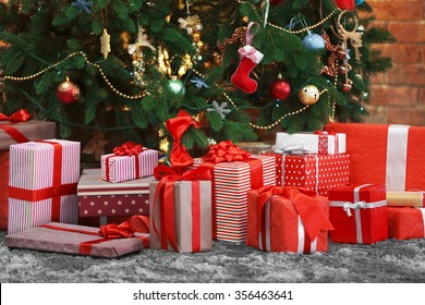 Presents Under The Christmas Tree On Floor
