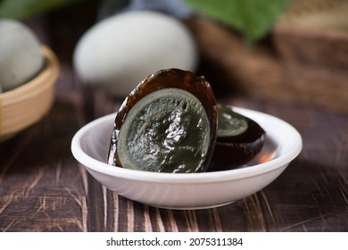 Preserved Duck Eggs Or Century Egg On Wood Background