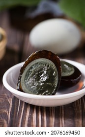 Preserved Duck Eggs Or Century Egg On Wood Background