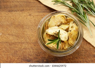 Preserved grill artichokes in oil with spices and herbs