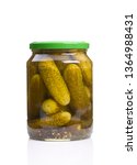 preserved pickled gherkins on white background 