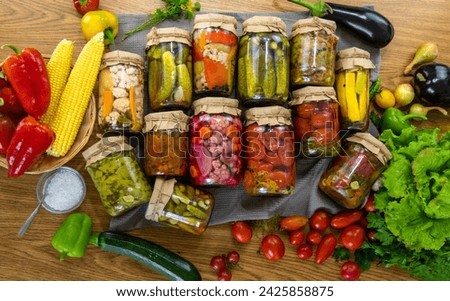 Preserving vegetables in jars in the kitchen. Selective focus. Food.