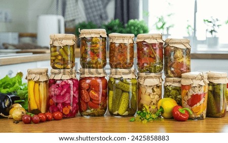 Preserving vegetables in jars in the kitchen. Selective focus. Food.