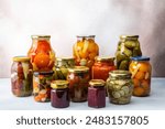 Preserving vegetables for the winter, canned vegetables and adjika, jam and vegetable salads, pickled or fermented vegetables, copy space