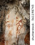 Preshistoric petroglyph rock paintings in Raja Ampat, West Papua, Indonesia. Aborigines from Australia left their markings in the form of rock paintings in and around Misool Island in Raja Ampat.