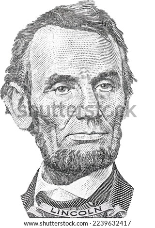 President Abraham Abe Lincoln face portrait on 5 dollar bill isolated, five usd, US money closeup