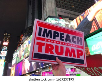 PRESIDENT DONALD J TRUMP IMPEACHMENT PROTEST - NEW YORK CITY, TIMES SQUARE - DECEMBER 2019 