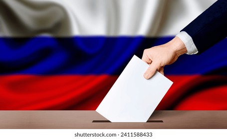 Presidential elections of the Russian Federation. Hand holding ballot in the ballot box with Russia flag in the background