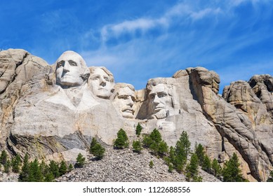 Presidential sculpture at Mount Rushmore national memorial, USA. Sunny day, blue sky. - Shutterstock ID 1122688556