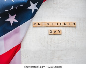 Presidents' Day. Beautiful greeting card. White, isolated background, close-up, top view, wooden surface. Congratulations for loved ones, relatives, friends and colleagues