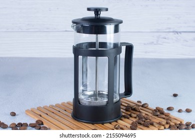 Press Coffee Maker, Under Pressure To Make Fresh Coffee, Bronze Color On Gray Background