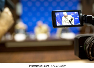 Press Conference, Blurred Background. The Head Of Roscosmos Dmitry Rogozin In The Camera Lens. Baikonur, Kazakhstan - March 20, 2020