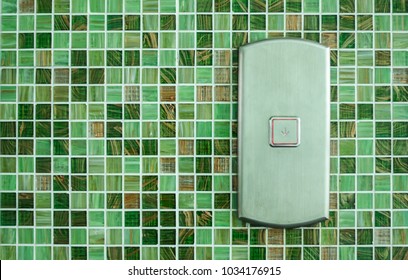 Press the elevator Down and keypad elevator With Green Tile wall