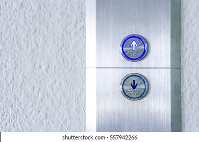 Press the elevator up and keypad elevator  - Powered by Shutterstock