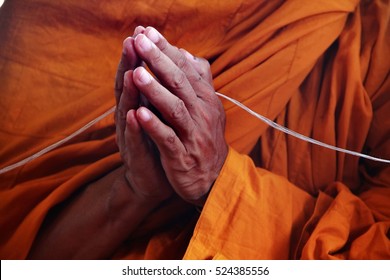  press the hands and  holy thread abstract for worship in buddhism religion