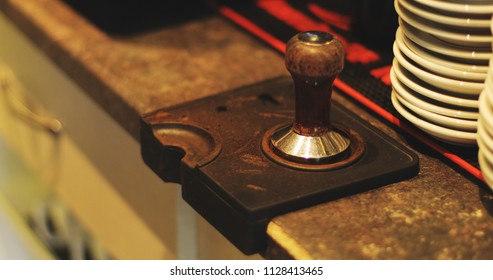 Press for making ground coffee. Close up. - Shutterstock ID 1128413465