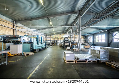 Press printing printshop Offset machine. Offset press is a printing machine designed to produce fine quality reproductions
