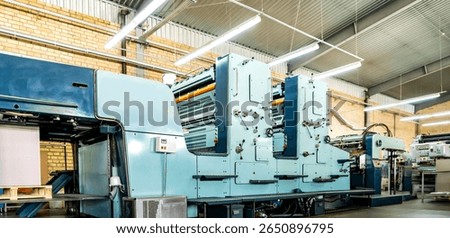 Press printing printshop Offset machine. Offset press is a printing machine designed to produce fine quality reproductions