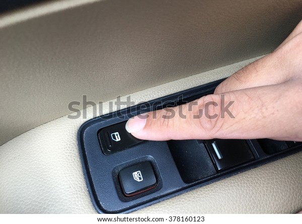 Press the switch lock\
windows in cars