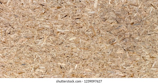 Pressed wooden panel seamless texture of oriented strand board - OSB - Shutterstock ID 1239097627