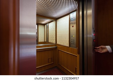 Pressing The Button In The Fancy Luxury Hotel Elevator