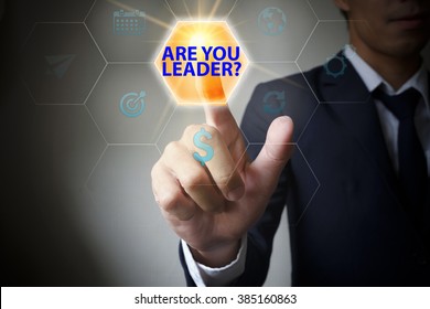 pressing button touch screen interface and select ARE YOU LEADER. business concept , business idea , strategy concept