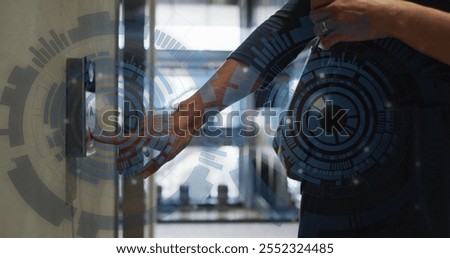 Pressing elevator button, person interacting with futuristic digital interface image. Technology, innovation, touchscreen, interaction, automation, high-tech