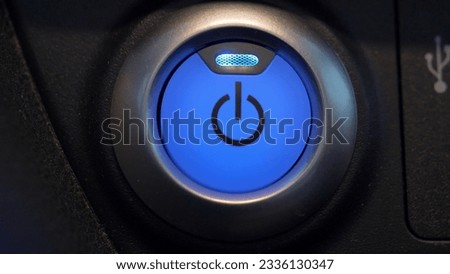 Pressing Stand By Power Button To Turn On and Off the Electric Car Close-Up
