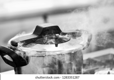 Pressure Cooker Steam Over Cooking In A Kitchen 