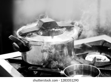 Pressure Cooker Steam Over Cooking In A Kitchen 