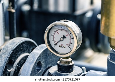 Pressure gauges mounted on the pipeline. Measuring instruments for pressure control.
