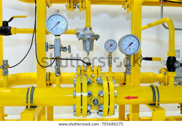 Pressure meters on\
natural gas pipeline.