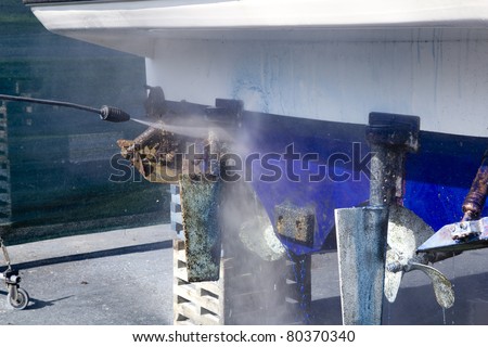 pressure washer cleaning boat hull barnacles anti-fouling and seaweed