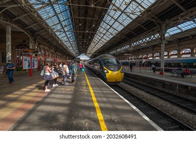 Preston , Lancashire-England - 26.08.2021 - Platform 4 Preston Passengers Waiting To Board British Rail Class 390 Electric High-speed Passenger Train Avanti West Coast Service To London