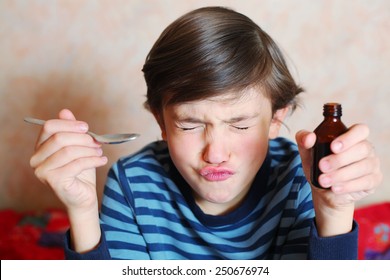 Preteen Handsome Boy Make A Grimace After Taking Bitter Medicine