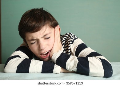 Preteen Handsome Boy Suffering From Severe Tooth Pain Close Up Portrait