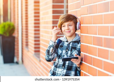 10 Year Old Boy With Earphones Images Stock Photos Vectors