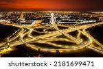 Ribeirão preto brazil viaduct, drone showing streets and avenues at sunset. Car light streak.