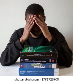 Pretoria, Gauteng / South Africa 08-07-2020

Black African Students Holds Head As He Is Stressed Out With School