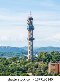 Pretoria, Gauteng, South Africa - Dec. 20 2020:  The Telkom Communication Tower, A Marvel Of Engineering Achievement, Towering Over The Pretoria Cityscape, South Africa.