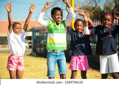 Pretoria, South Africa - August 26 2009: Diverse African Primary School Children Doing Physical Exercise PT Lesson