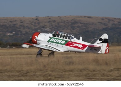 PRETORIA, SOUTH AFRICA-JUNE 10 2017 :  A Puma Energy Harvard Landing At The  Airlink Adrenaline Airshow At Wonderboom Airport.