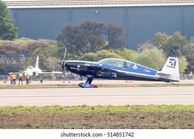 PRETORIA, SOUTH AFRICA-SEPTEMBER 17 2016: Jason Beamish Landing In His Extra Aerobatic Aircraft At The African Air Defense Show At AFB Waterkloof