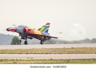 PRETORIA, SOUTH AFRICA-SEPTEMBER 17 2016: An  Ex-SAAF Cheetah Jet Aircraft Braking With A Drag Parachute At  The African Air Defense Show At AFB Waterkloof