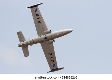 PRETORIA, SOUTH AFRICA-SEPTEMBER 17 2016: An Impala Light Trainer Jet In Old SAAF Colours Banks Away At The African Air Defense Show At AFB Waterkloof